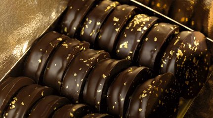 boite de chocolats Voisin contenant des palets d'or